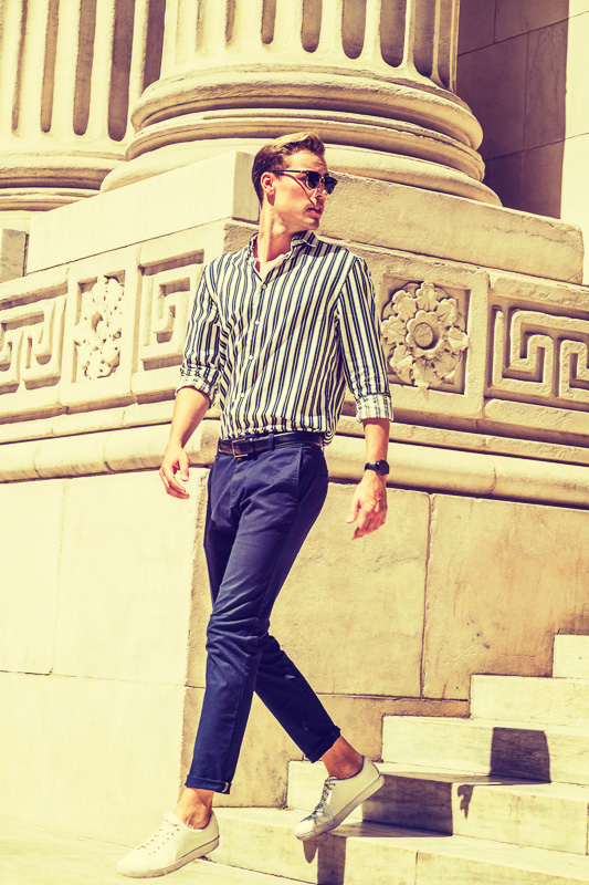Young Man Walking Down Stairs