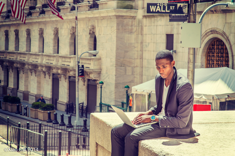 Young man working on street