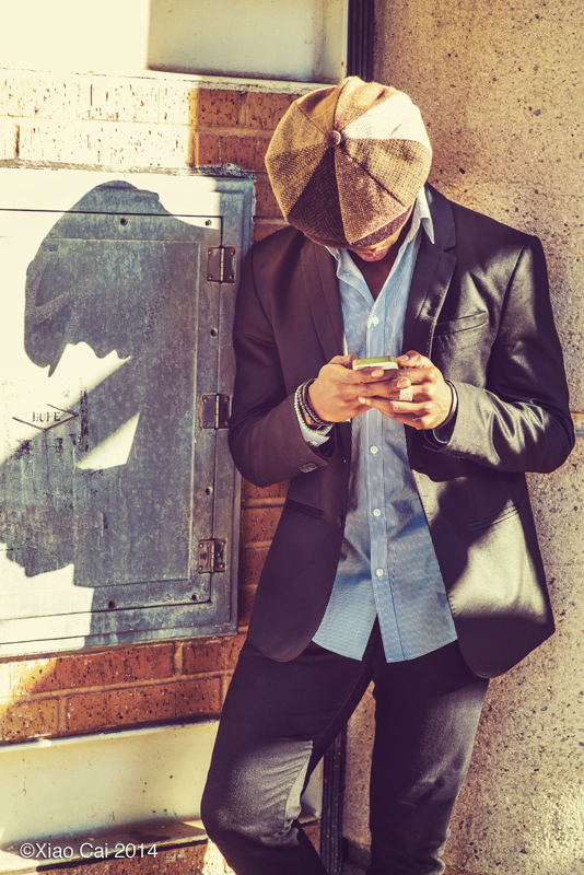 Man Texting On Street